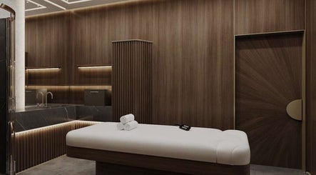 Luxurious treatment room at Lifting Pro Face and Body Treatments Spa in Dubai, Dubai, AE with soft ambient lighting.