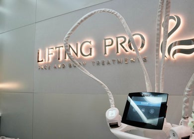 Modern treatment room at Lifting Pro Face and Body Treatments Spa, Dubai, Dubai, AE, showcasing advanced equipment.