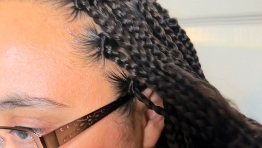 Close-up of intricate braids at BraidsbyAnesu in Huddersfield, England, GB.