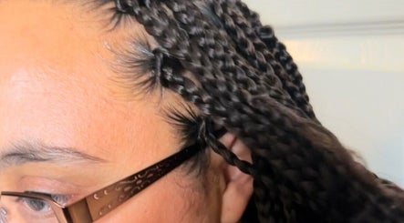 Close-up of intricate braids at BraidsbyAnesu in Huddersfield, England, GB.