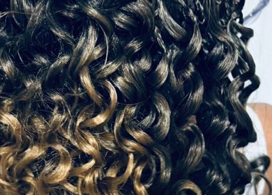 Close-up of intricate braids and curls at BraidsbyAnesu, Huddersfield, England, GB.