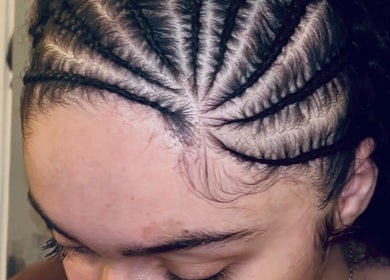 Close-up of elegant cornrow braids by BraidsbyAnesu in Huddersfield, England, GB.