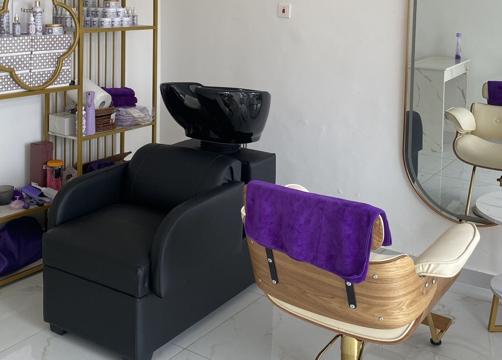 Chic seating and styling area at Nappytalia Salon, Accra, Greater Accra Region, GH, highlighting luxury setup.