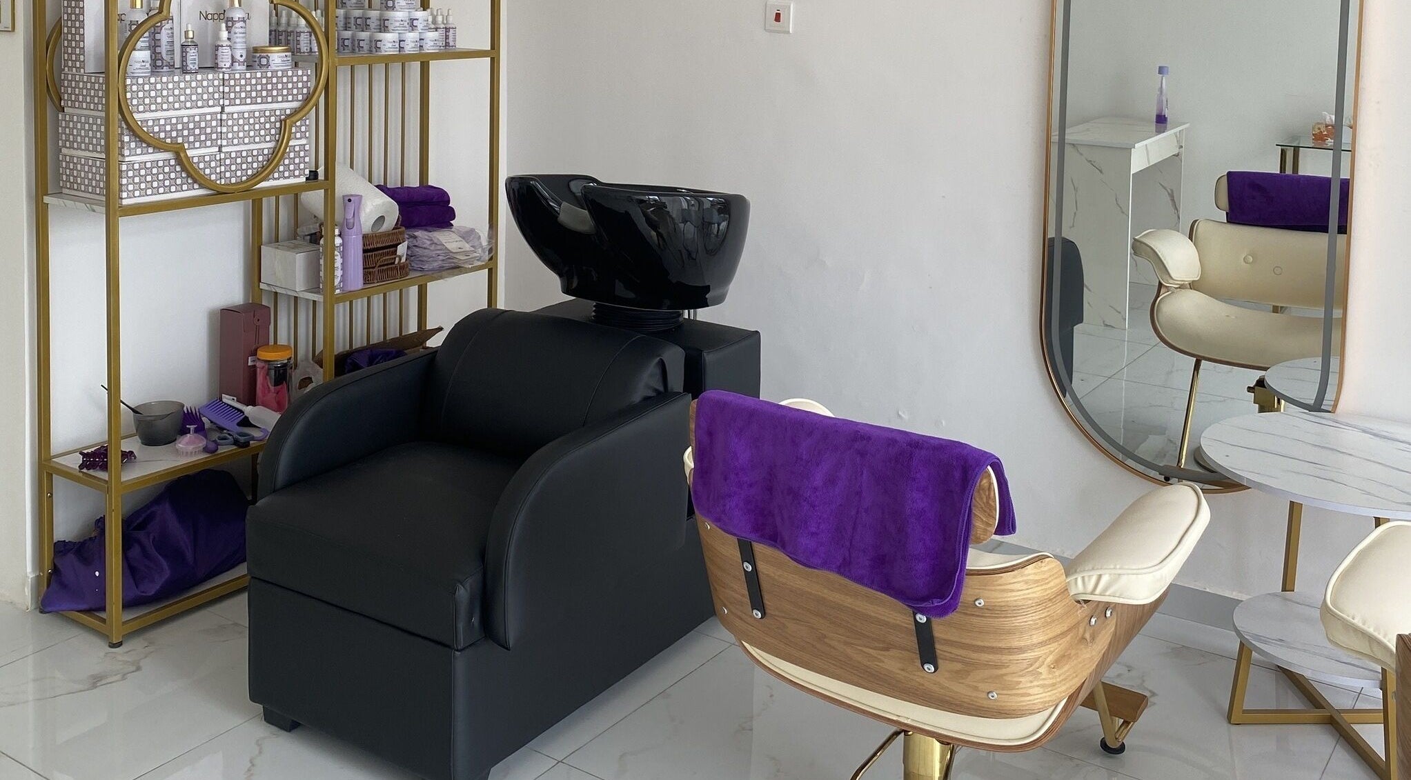 Chic seating and styling area at Nappytalia Salon, Accra, Greater Accra Region, GH, highlighting luxury setup.