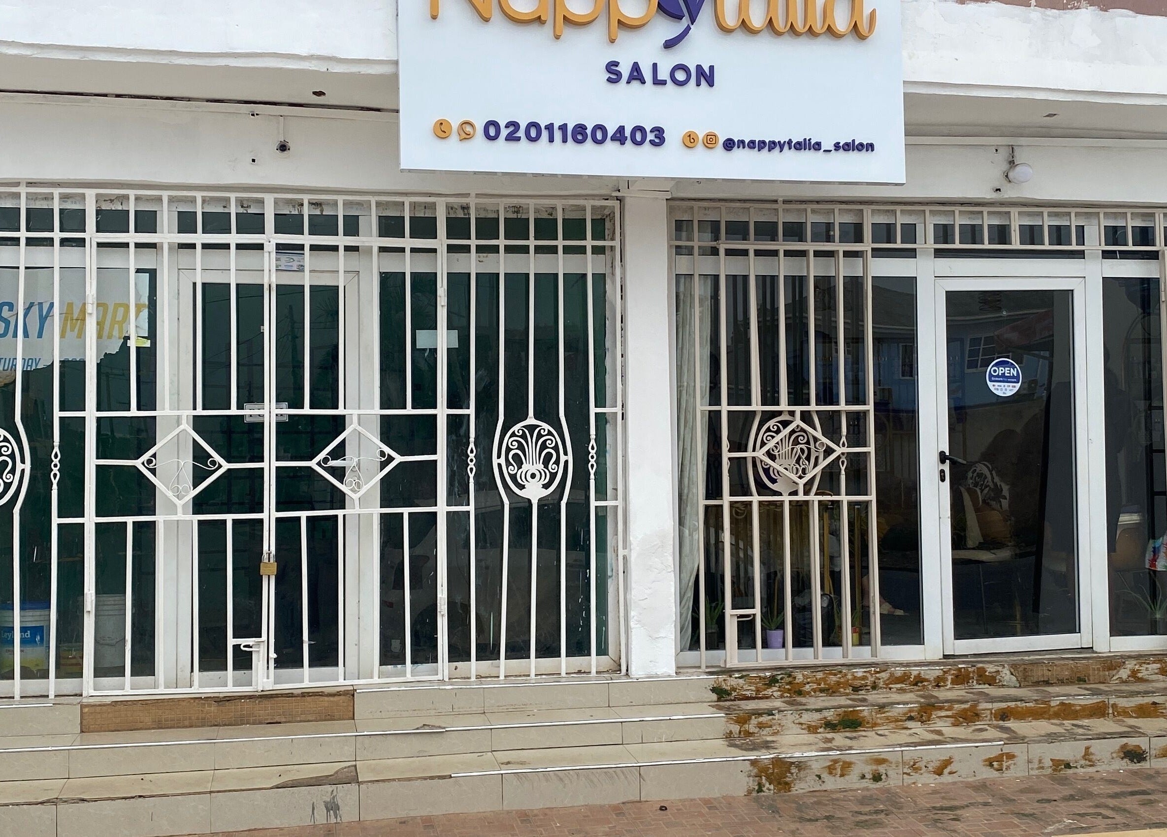 Exterior view of Nappytalia Salon in Accra, Greater Accra Region, GH showcasing modern design.