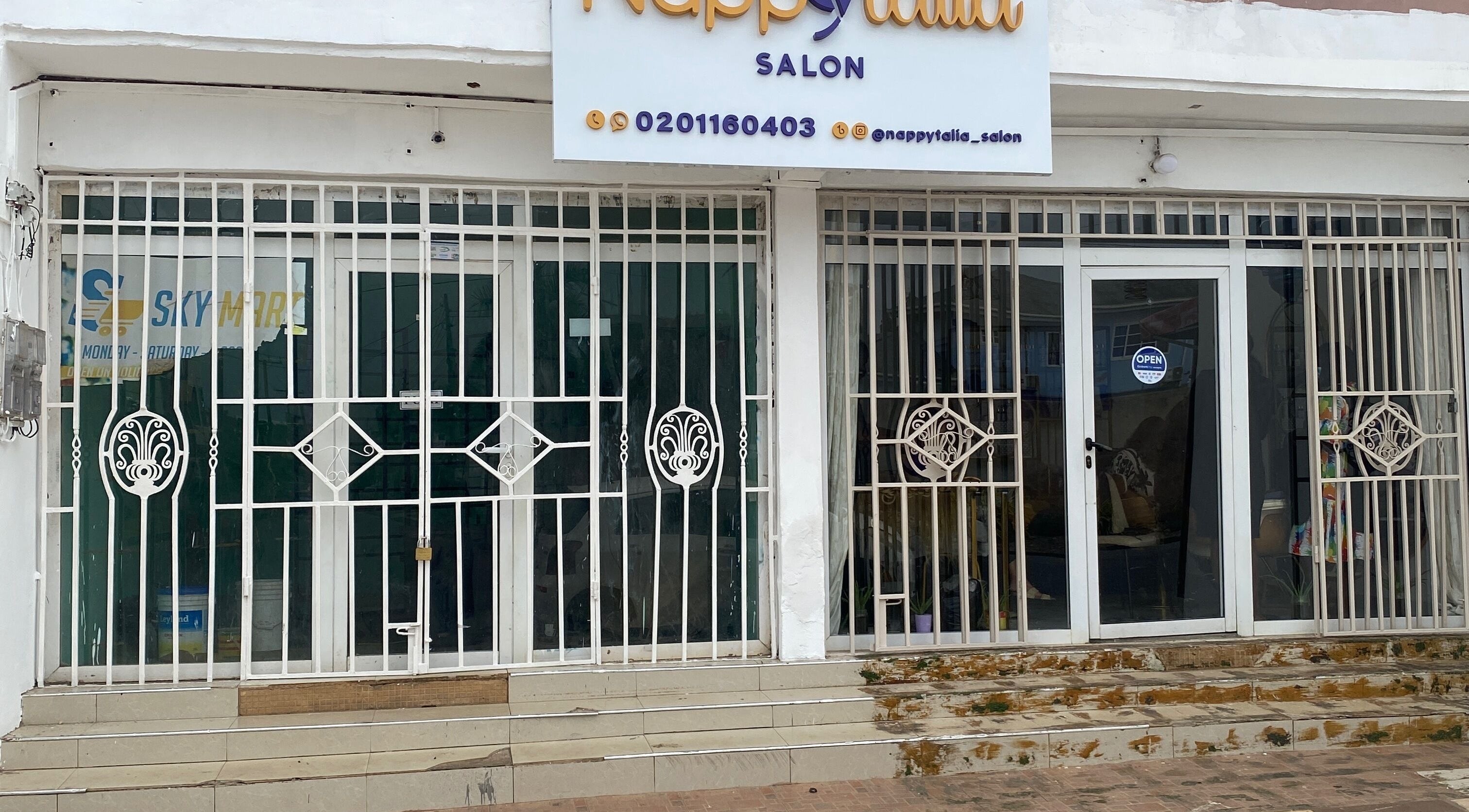 Exterior view of Nappytalia Salon in Accra, Greater Accra Region, GH showcasing modern design.