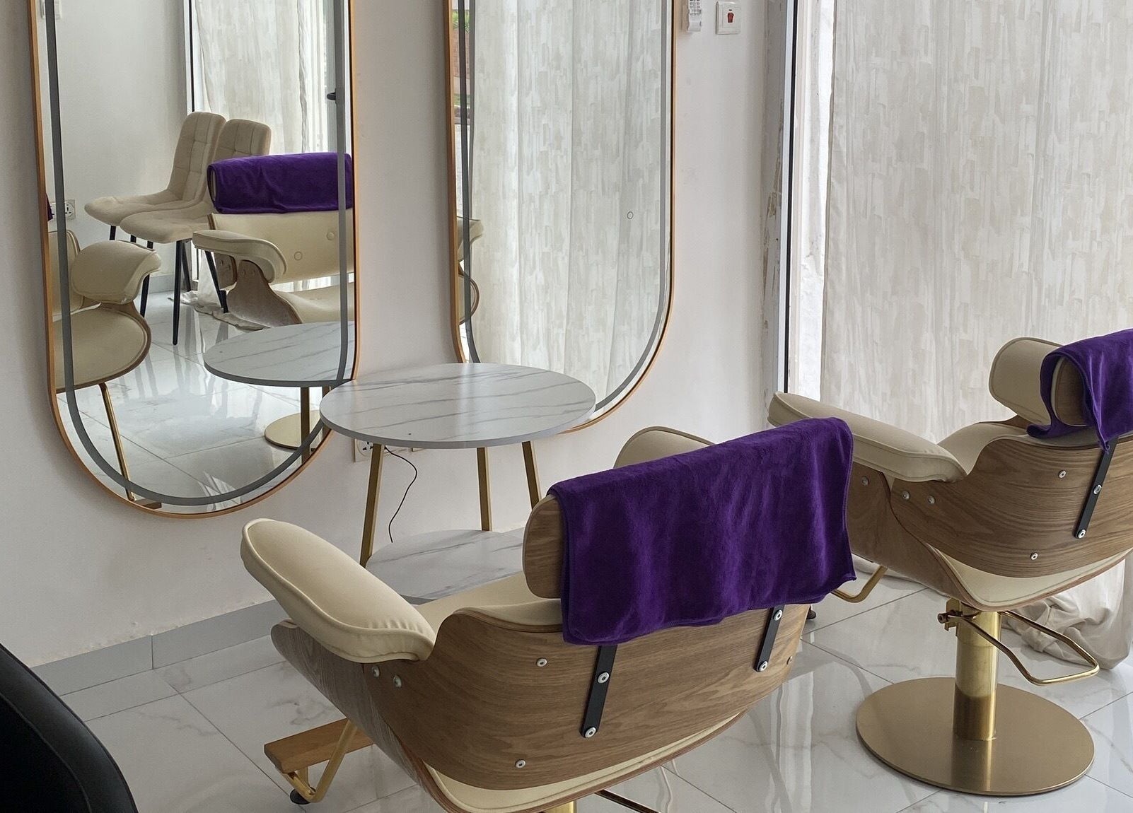 Chic salon chairs at Nappytalia Salon in Accra, Greater Accra Region, GH, featuring modern design and comfort.