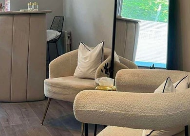 Plush seating area at Beauty By Ang, Plymouth, England, GB, showcasing elegant and modern interior design.