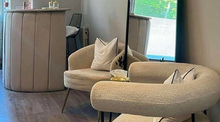 Plush seating area at Beauty By Ang, Plymouth, England, GB, showcasing elegant and modern interior design.