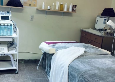 Relaxing treatment room at Angelite Esthetics, featuring modern equipment. Located in Toronto, Ontario, CA.