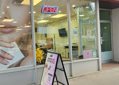 Front view of Angelite Esthetics in Toronto, Ontario, CA with an eye-catching sign and welcoming decor.