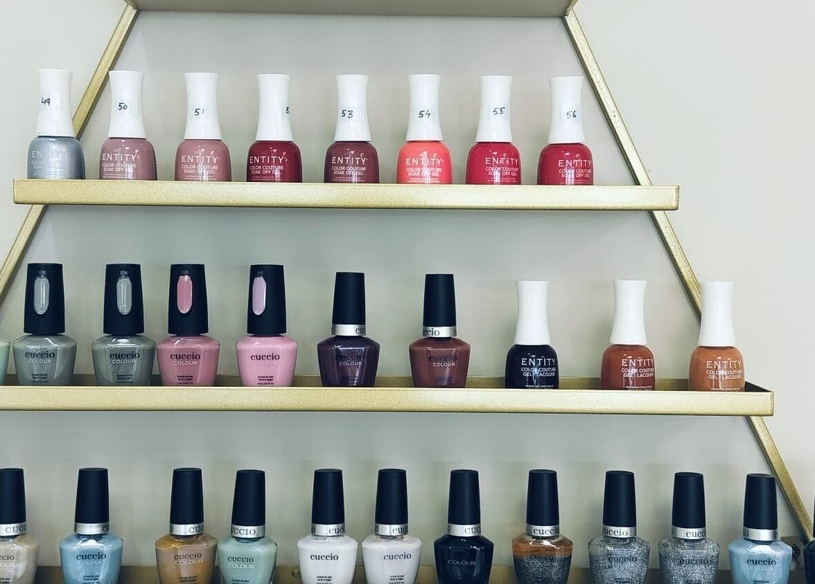 Colorful nail polishes on display at Angelite Esthetics, Toronto, Ontario, CA. Beauty and wellness venue.