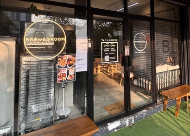 Entrance of B&G by Brew&Groom in Gombak, Kuala Lumpur, showcasing modern barbershop and cafe vibe.