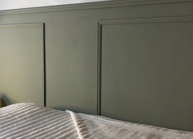 Peaceful treatment room at Bare Skin Clinic, Ashington, England, GB with soft lighting and plush bedding.