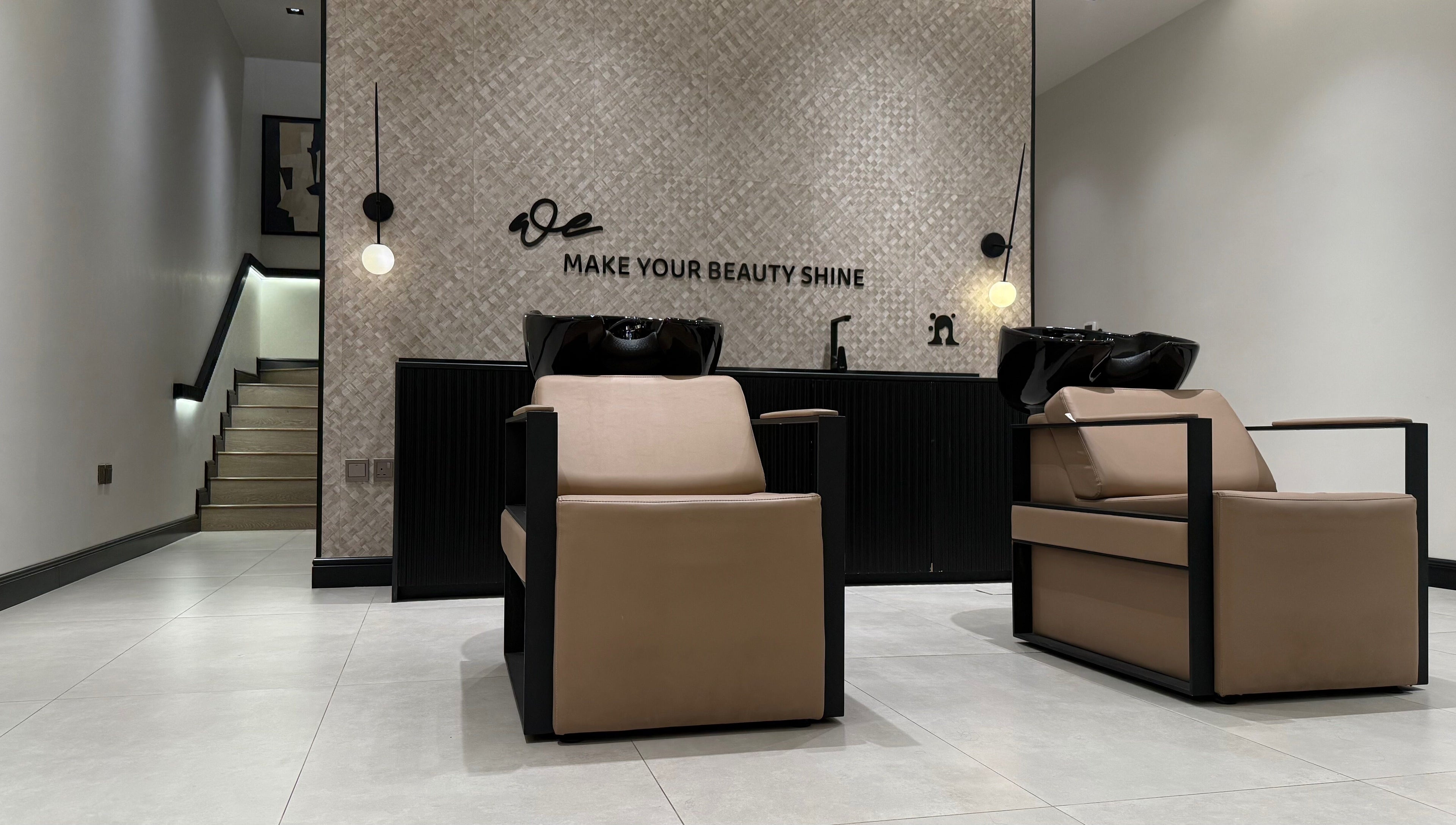 We Salon's chic interior with modern chairs in Riyadh, Riyadh Province, SA showcasing luxury ambiance.