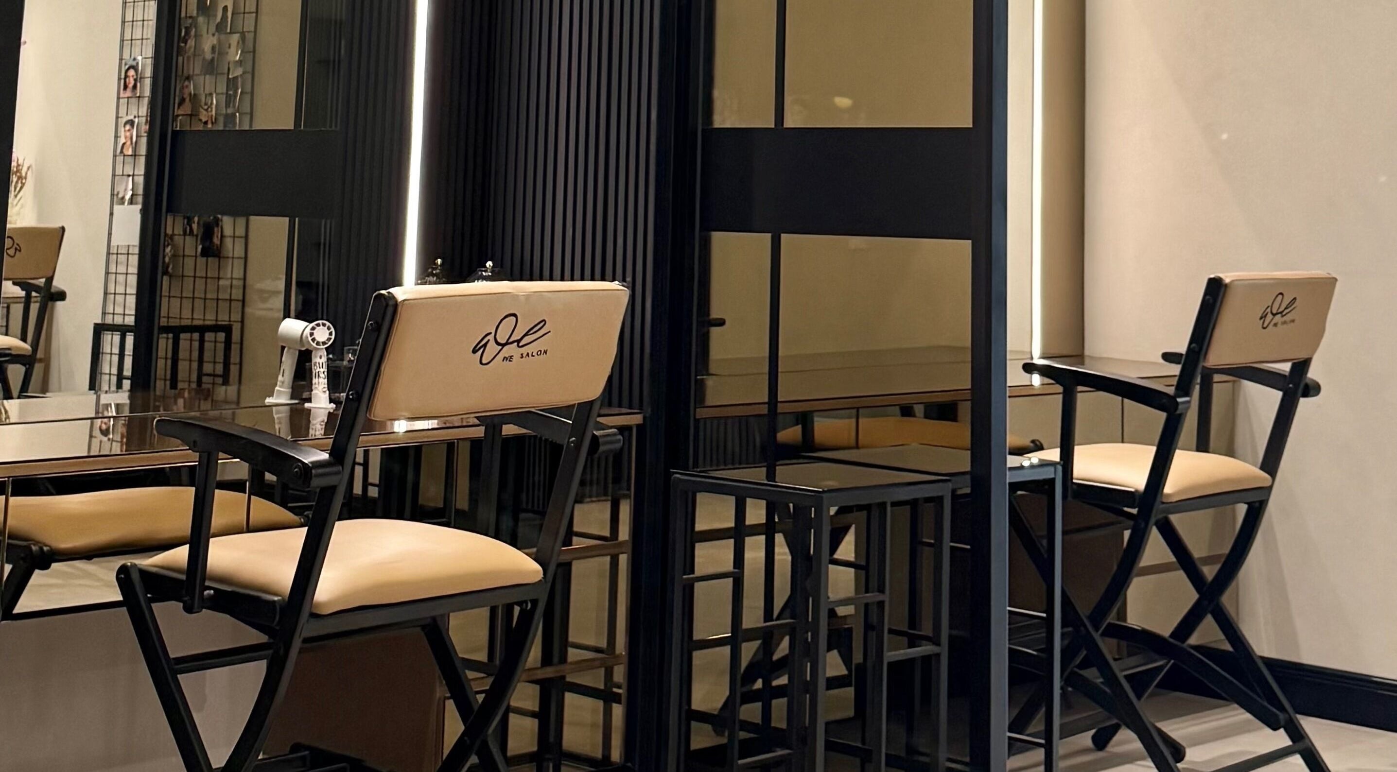 Modern salon chairs at We Salon in Riyadh, Riyadh Province, SA, showcasing a stylish interior design.