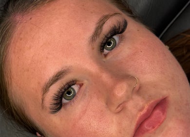 Close-up of lush eyelash extensions at Lash J Kreation, Cork, County Cork, IE, highlighting green eyes.