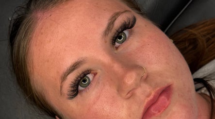 Close-up of lush eyelash extensions at Lash J Kreation, Cork, County Cork, IE, highlighting green eyes.