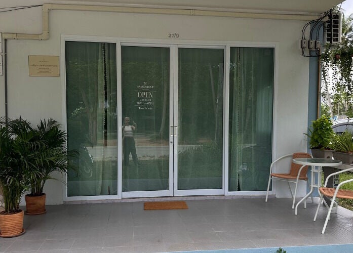 Entrance to Armonique | Body Contouring & Anti-Cellulite Studio in Chang Wat Surat Thani with cozy outdoor seating.