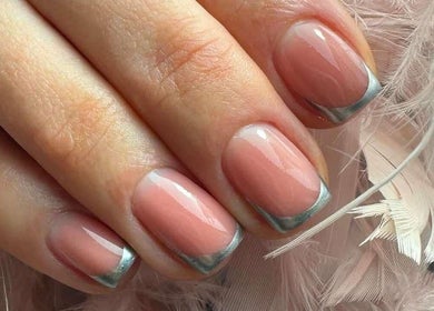 Elegant silver-tipped nails styled at TyNails by Tatiana Samson, Portsmouth, England, GB.