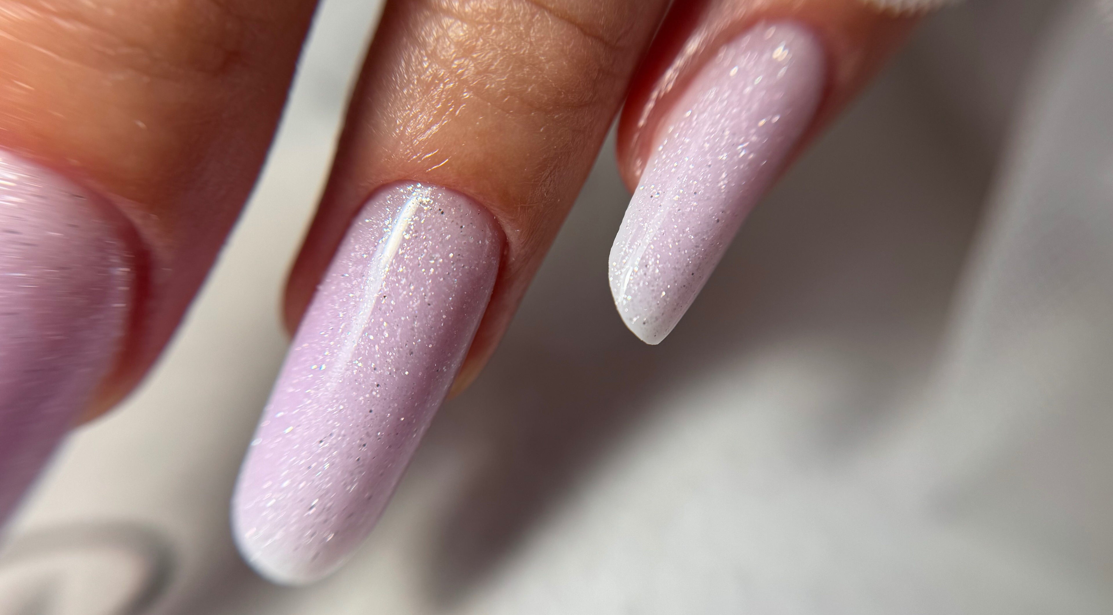Elegant pink glitter nails styled at TyNails by Tatiana Samson, Portsmouth, England, GB.