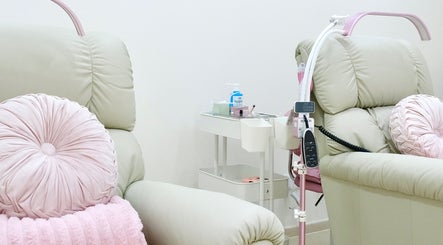 Comfortable salon chairs at Blinkbar at Orchard Gateway, Singapore, SG with plush cushions and beauty tools.