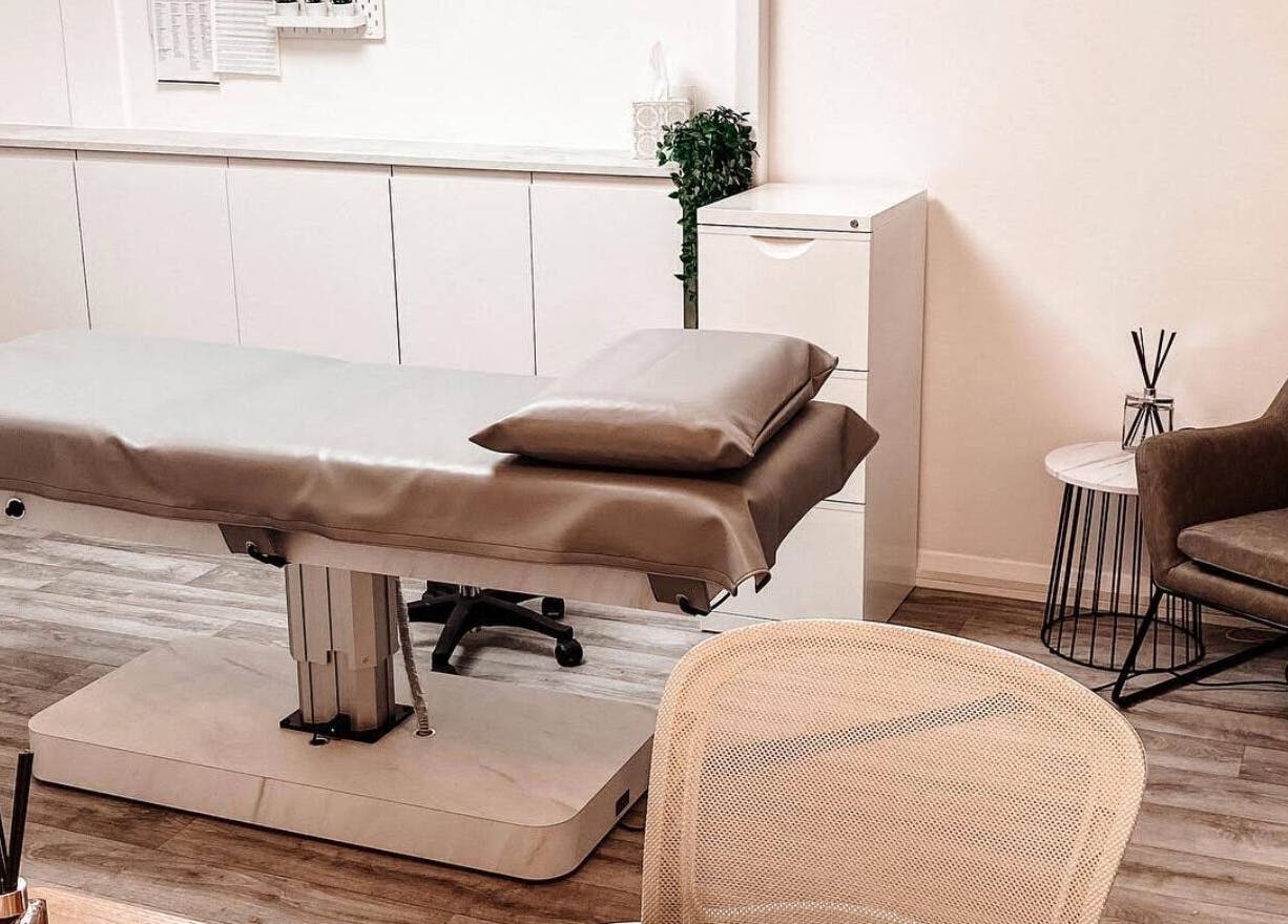 Cozy treatment room at Skiin Laser Clinic in Peterborough, England, GB showcasing a comfortable reclining chair.
