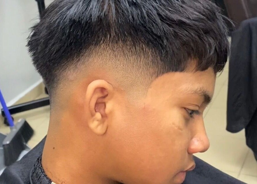 Close-up of a stylish fade haircut at Qnd Barbershop, Hulu Langat, Selangor, MY.