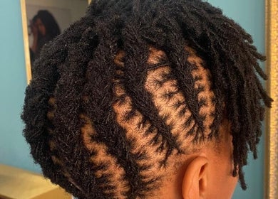 Stylish dreadlock hairstyle at Nubian Crown Durban, located in Durban, Kwazulu-Natal, ZA.
