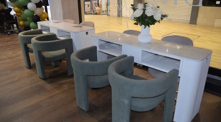 Euphoria Nails elegant manicure station with plush chairs in Bournemouth, England, GB.