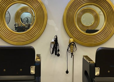 Elegant salon mirrors at Lyns Beauty Salon, Shah Alam, Selangor, MY, reflect luxury style in hair styling area.