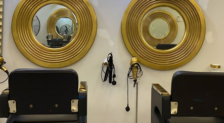 Elegant salon mirrors at Lyns Beauty Salon, Shah Alam, Selangor, MY, reflect luxury style in hair styling area.