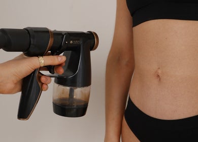 Spray tanning session at JM Sprays in CRIEFF, Scotland, GB, showcasing professional sunless tanning.