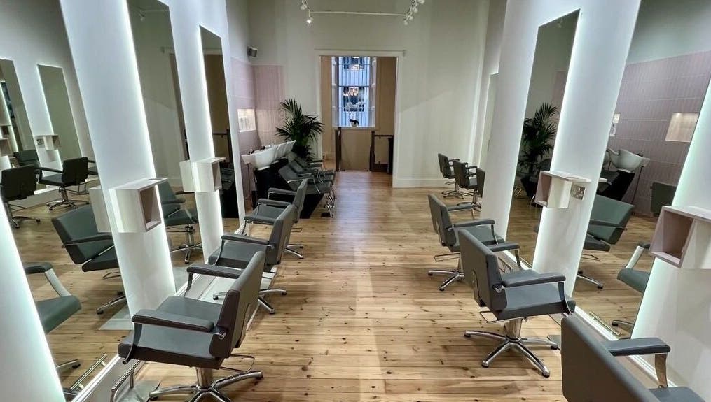 Modern salon interior at Erin Rose Nails, Edinburgh, Scotland, GB; sleek design with chairs and mirrors.