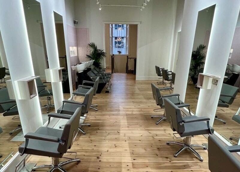 Modern salon interior at Erin Rose Nails, Edinburgh, Scotland, GB; sleek design with chairs and mirrors.