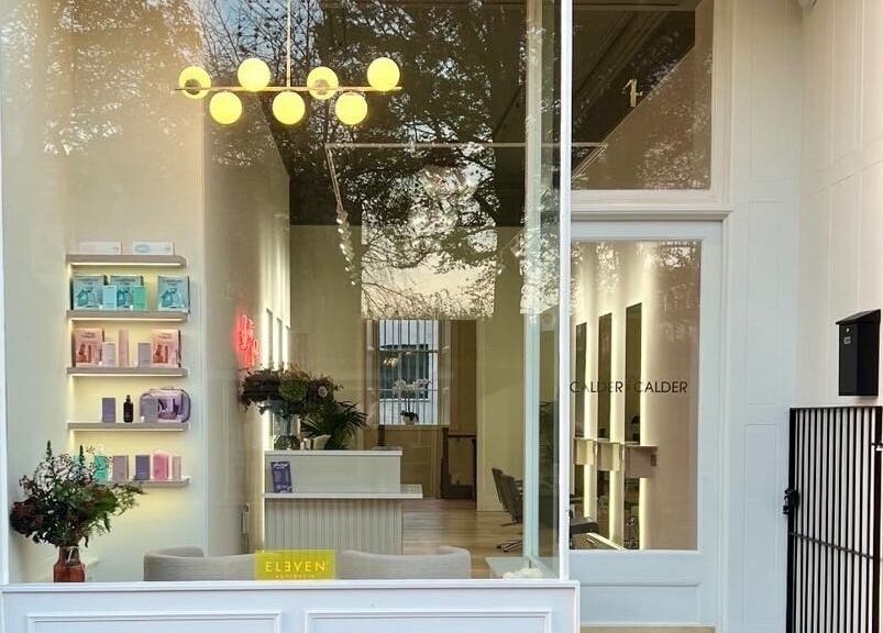 Elegant interior of Erin Rose Nails, Edinburgh, Scotland, GB with modern decor and ambient lighting.