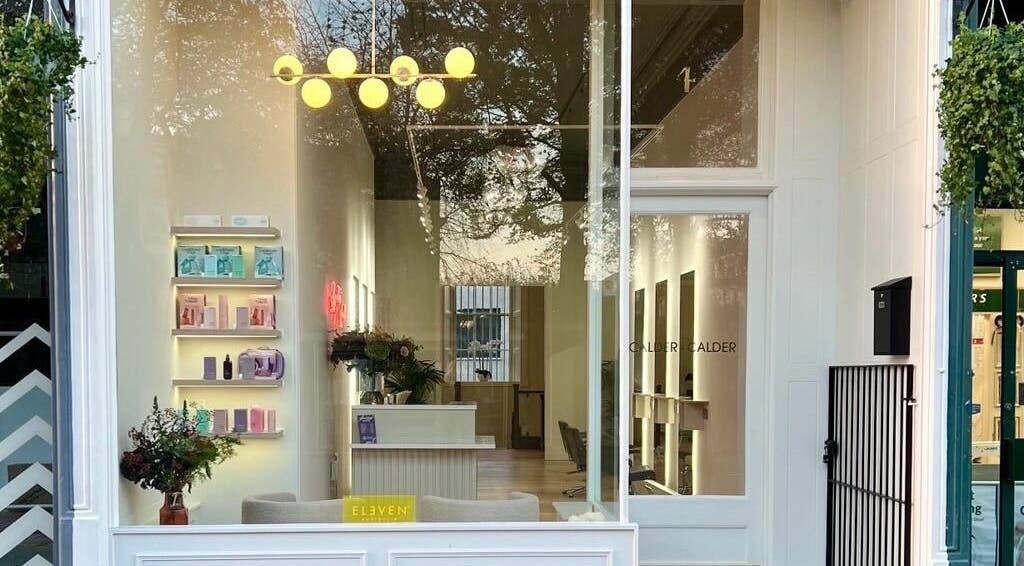 Elegant interior of Erin Rose Nails, Edinburgh, Scotland, GB with modern decor and ambient lighting.