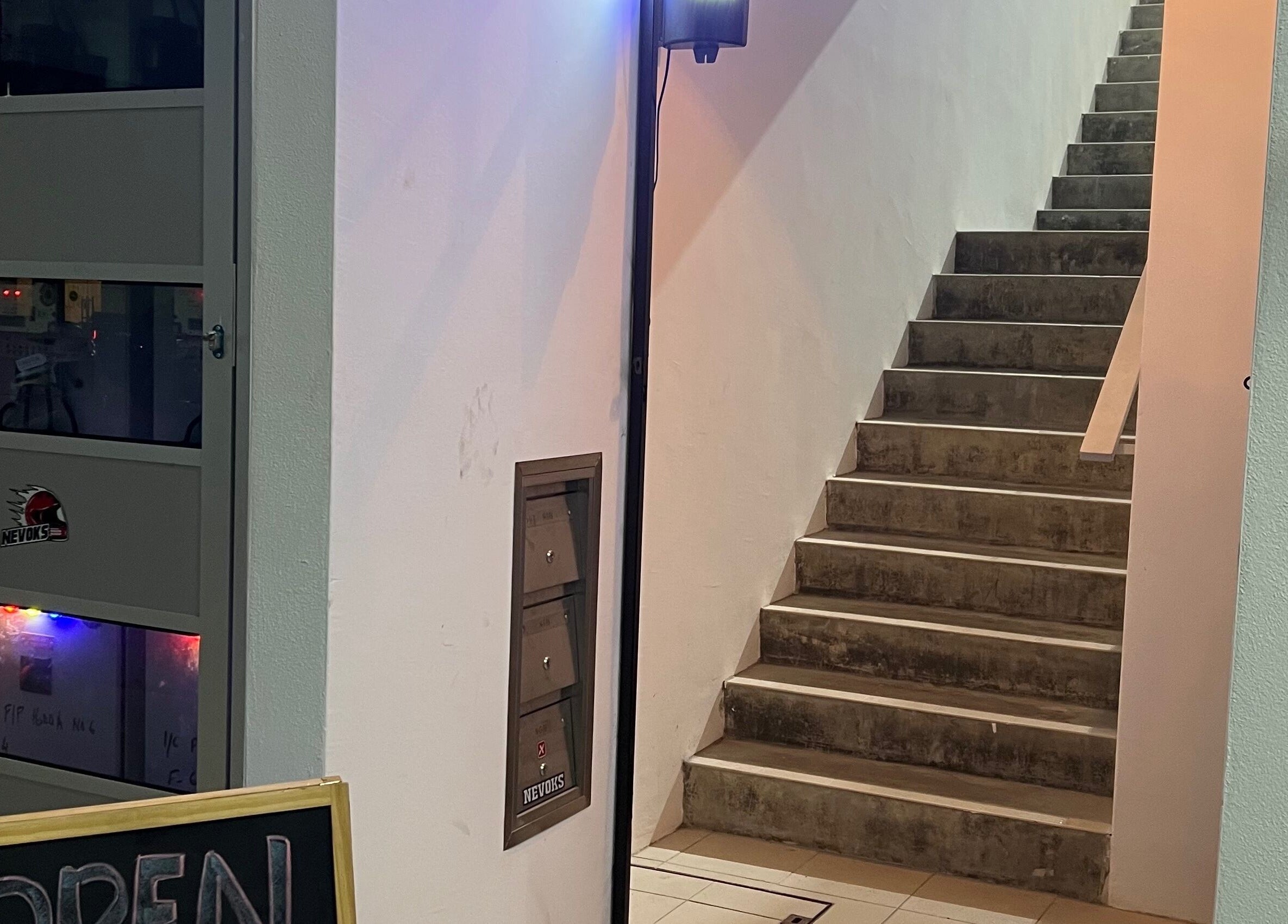 Entrance staircase to Wan’s Barbershop Tasik Puteri, Rawang, Selangor, MY, with an open sign.