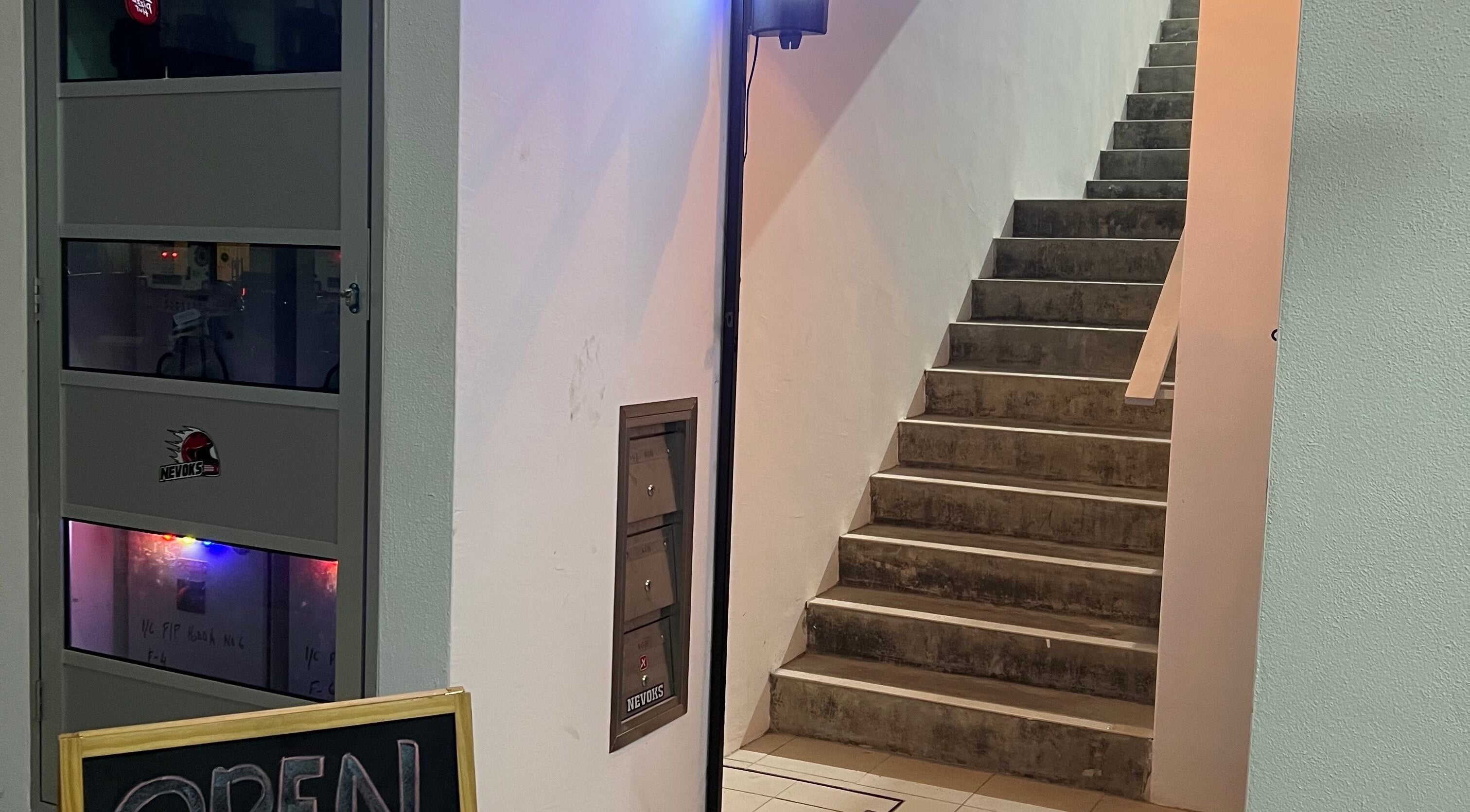 Entrance staircase to Wan’s Barbershop Tasik Puteri, Rawang, Selangor, MY, with an open sign.