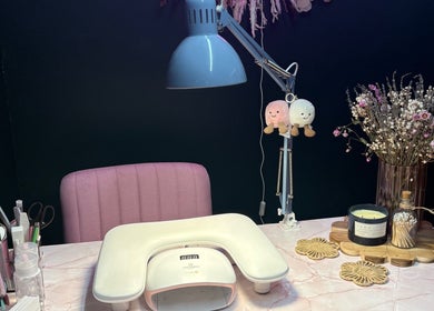 Elegant nail station at KB Nails Beauty, Purbrook, England, GB. Featuring tools, plush chair, and decor.