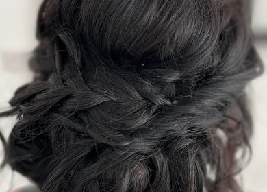 Close-up of a chic braided updo at Hair Craft & Co, Torquay, England, GB, showcasing expert hairstyling.