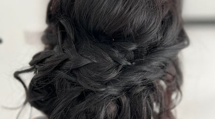 Close-up of a chic braided updo at Hair Craft & Co, Torquay, England, GB, showcasing expert hairstyling.