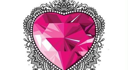 Detailed pink heart-shaped jewel design representing elegance at Hair Craft & Co, Torquay, England, GB.