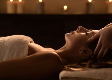 Peaceful massage session at Skin Therapy Spa - Denia, Denia, Alicante, ES with soft candlelit ambiance.