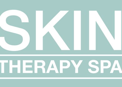 Skin Therapy Spa - Denia logo on a teal background, located in Denia, Alicante, ES.