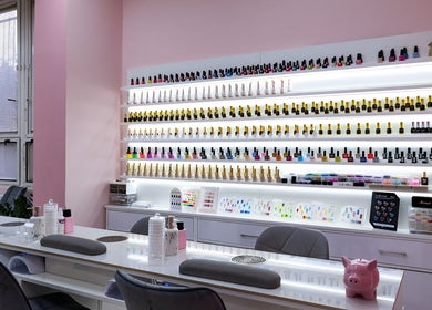 Nail polish display at Ell's Beauty Salon in Jihomoravský Kraj, CZ, showcasing vibrant colors.