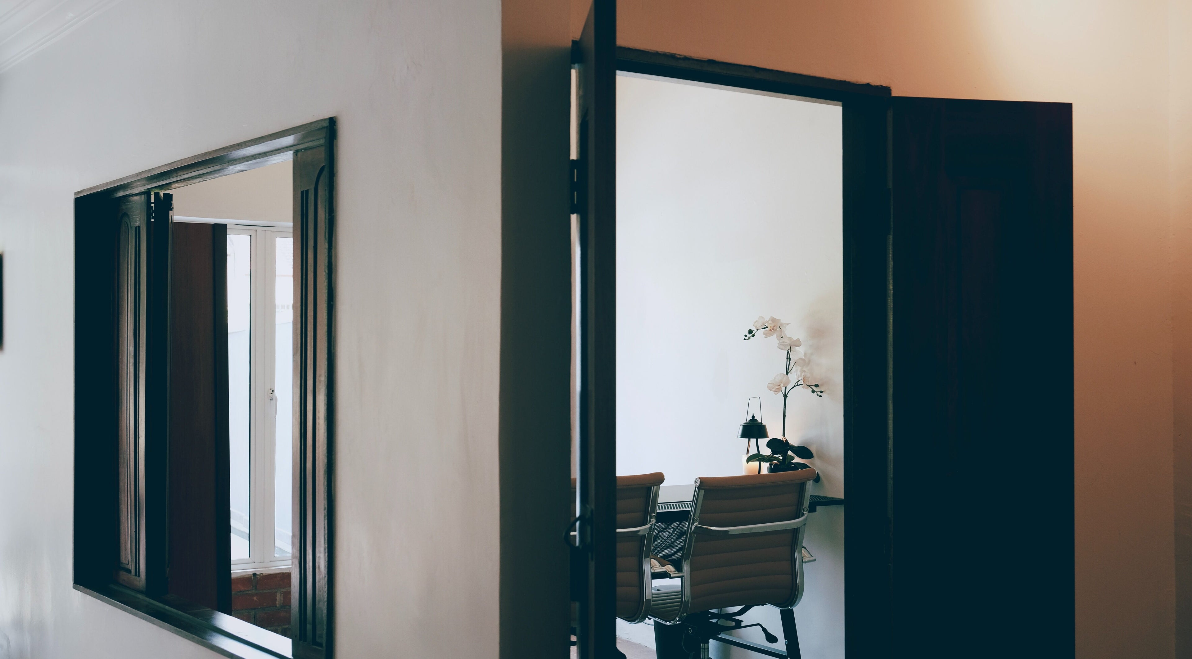 Elegant office room at Sage Centre, Subang Jaya, Selangor, MY with chairs and orchids.