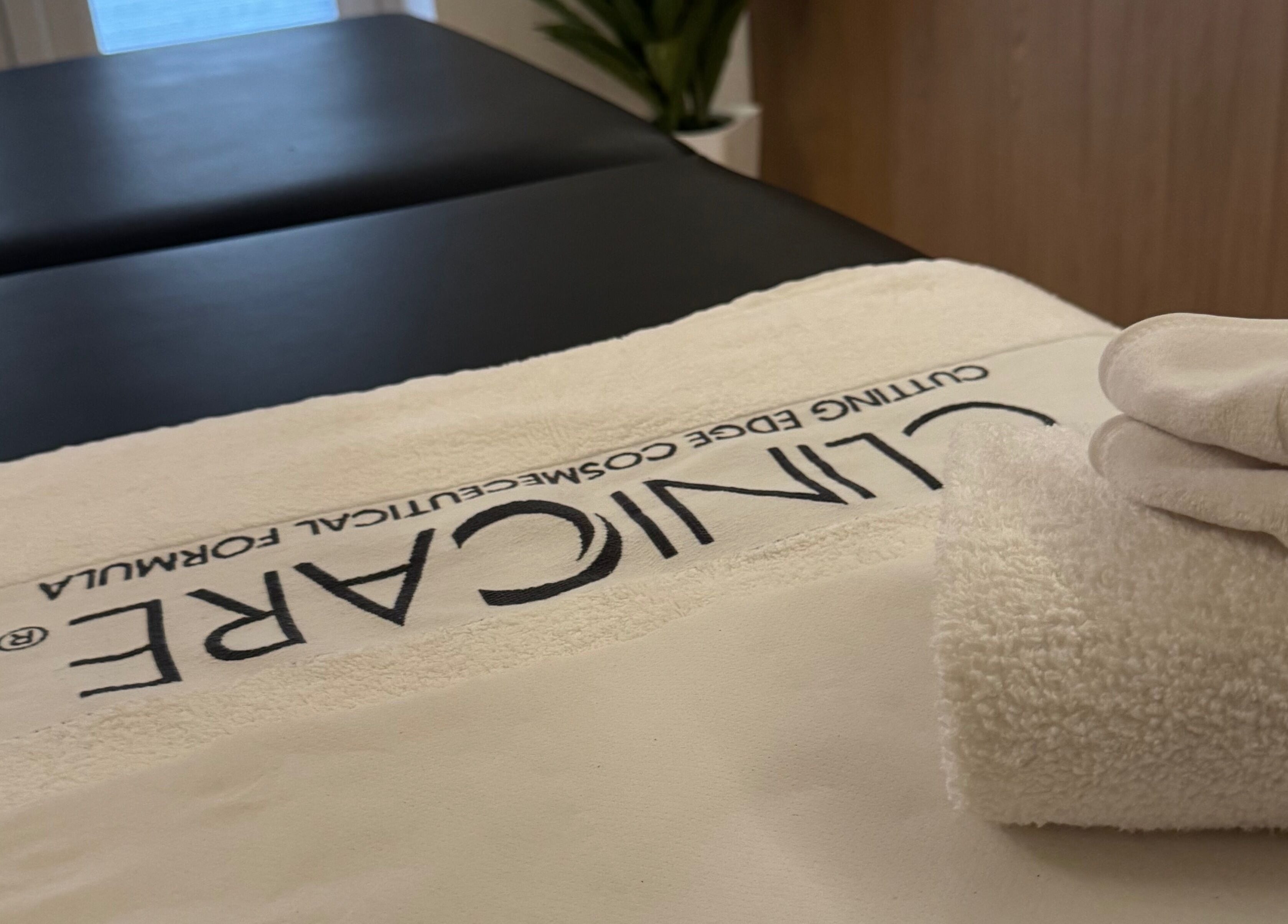 A spa treatment table with fresh towels at Definir, Galston, Scotland, GB.