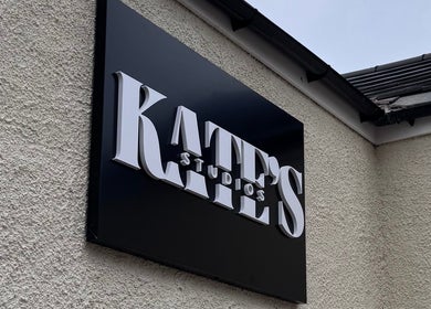 Kate's Studio exterior sign at Coalville, England, GB, showcasing bold white letters.