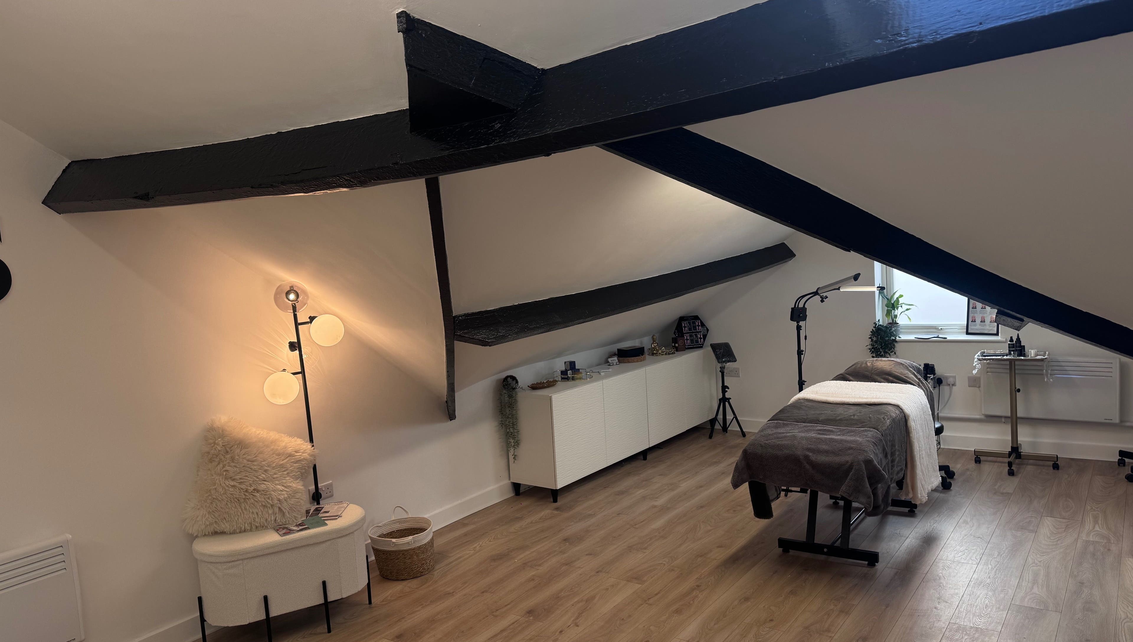 Relaxing treatment room at Kate's Studio, Coalville, England, GB. Elegant and warm ambiance for beauty services.